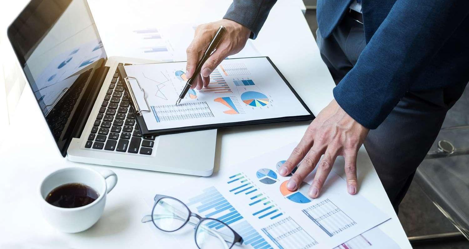 Midsection Of Businessman Working At Office Midsection Of Businessman Working At Office