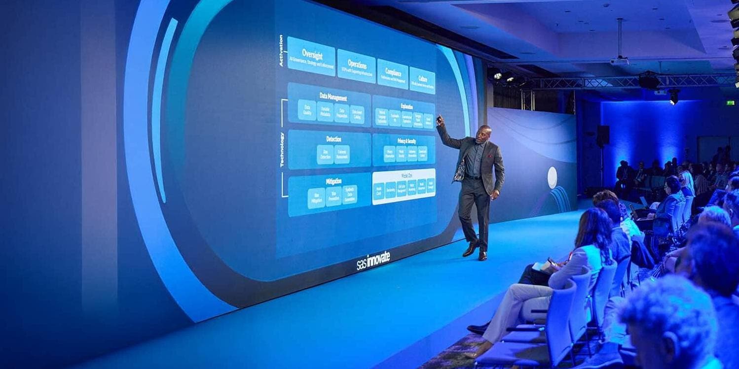 Reggie Townsend speaking on stage at SAS Innovate